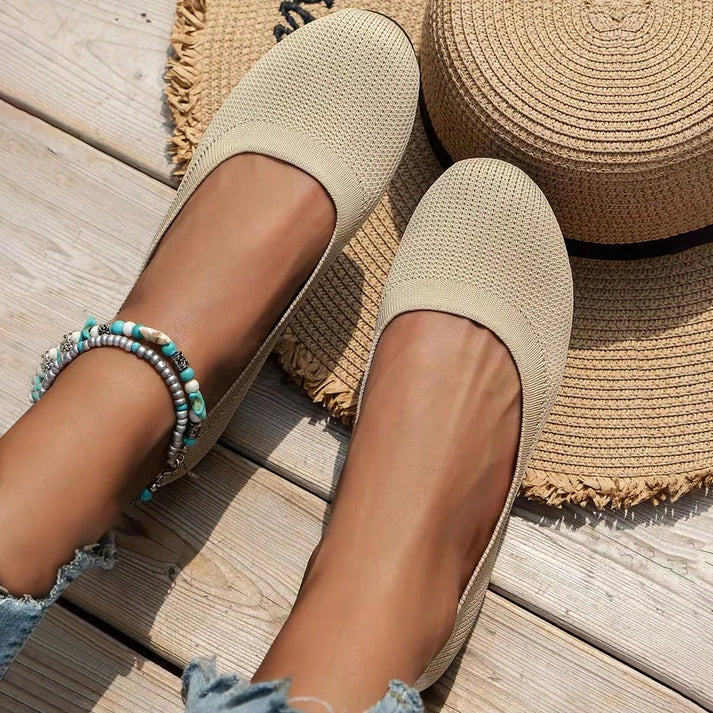 Close-up of cushioned women's slip-on ballet flats, designed for ultimate all-day comfort & support.