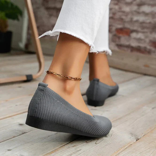 Soft material women's slip-on ballet flats, offering comfort and support for all-day casual wear.