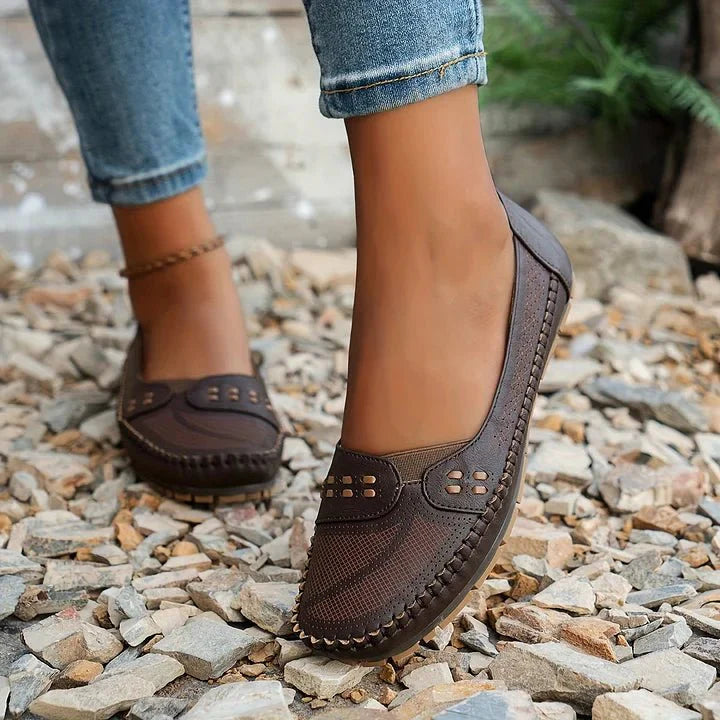 Chic women's perforated slip-on loafers, orthopedic comfort, versatile for all seasons.