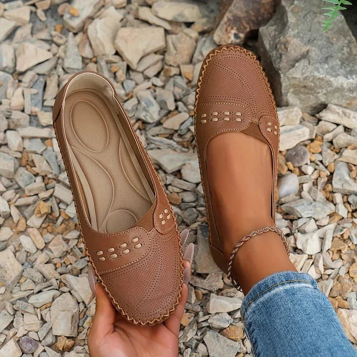 Orthopedic women's loafers, breathable perforated upper, easy slip-on style, ultimate comfort.