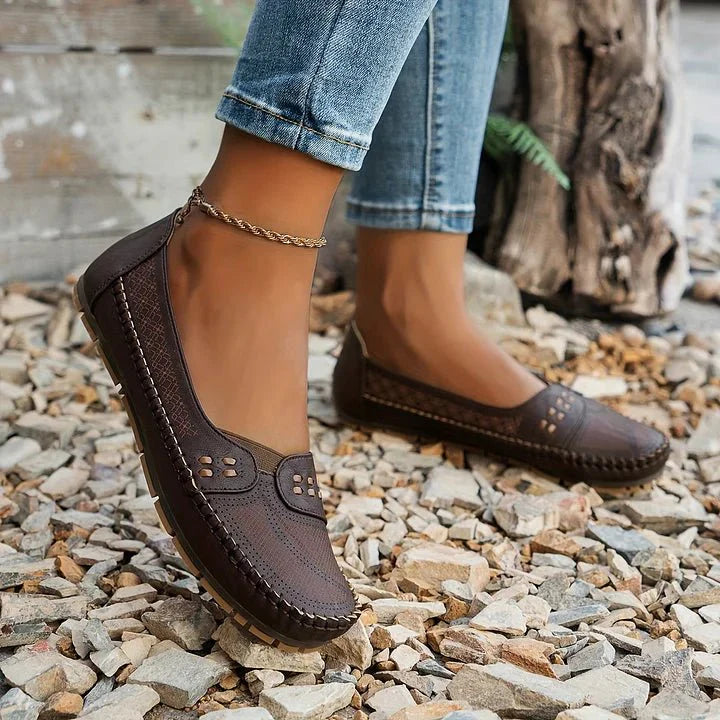 Women's comfortable flat sole loafers, slip-on style, perforated, perfect for casual outings.