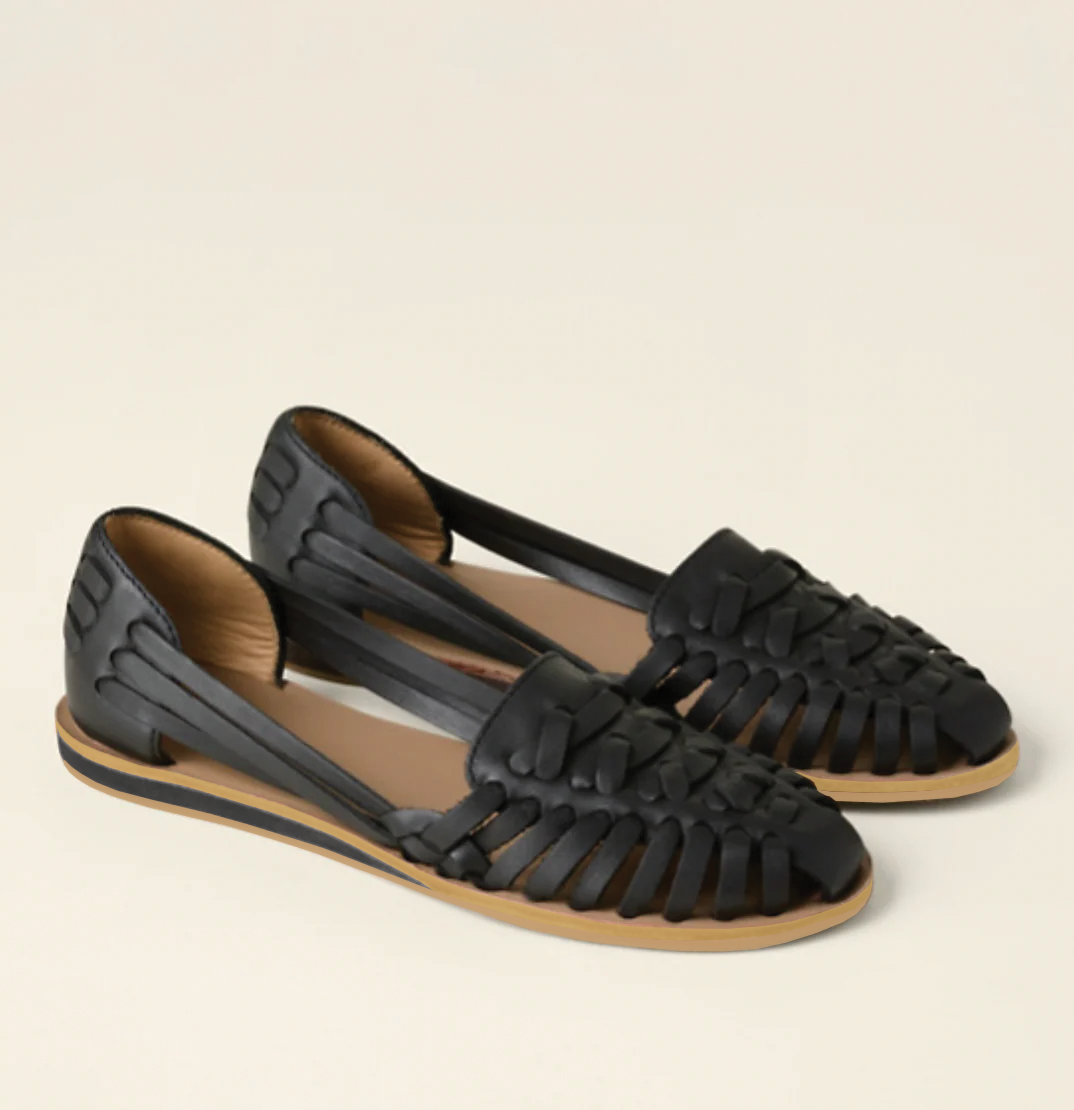 Women's comfortable slip-on sandals for effortless summer style. Lightweight, open-toe flat sandals for casual everyday wear.