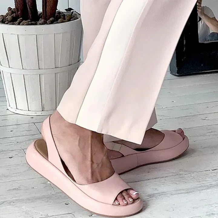 Stylish women's slip-on footbed sandals with open toe and elastic band for ultimate comfort.