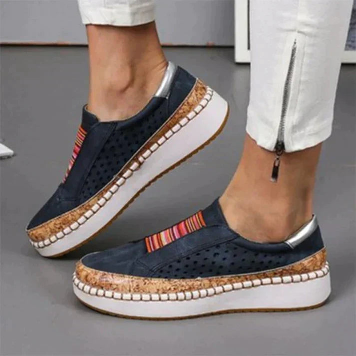 Stylish women's perforated slip-on shoes, perfect for walking and casual wear, featuring superior breathability.