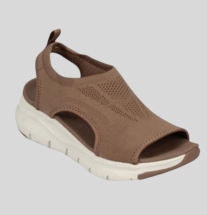 Fashionable women's open-toe spring sandals, designed for comfort with a soft sole and casual appeal.
