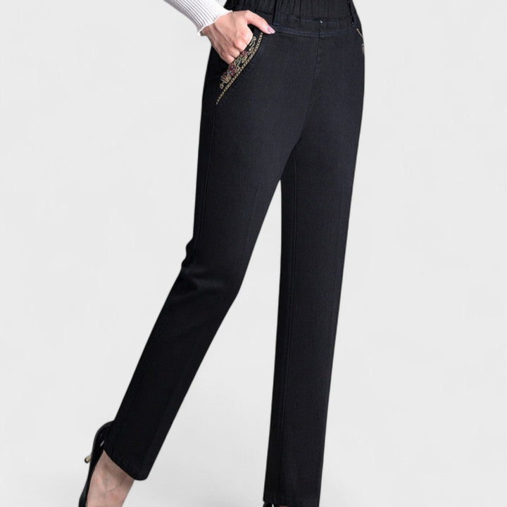 Modern women's stretch jeans, elastic waist, combining comfort with a stylish relaxed fit for any casual occasion.