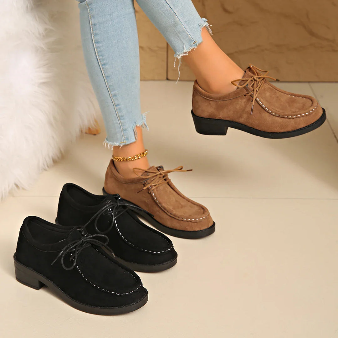 Group shot of women's comfortable loafers in various available colors, all featuring arch support