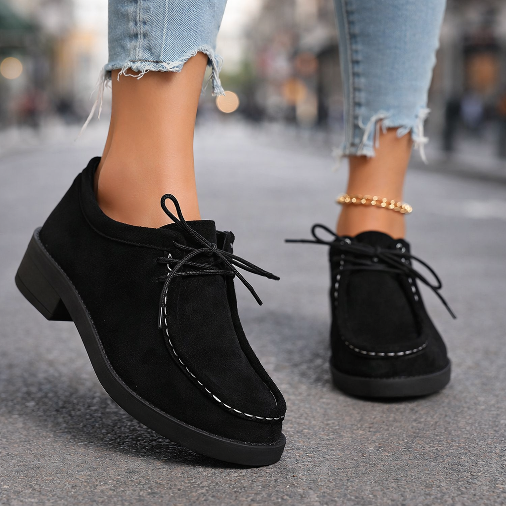 Close-up of the women's orthopedic loafer, highlighting the soft suede-like material and stitching details