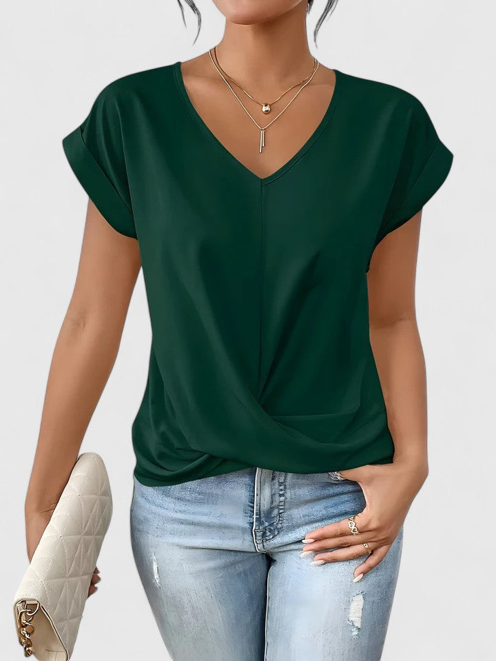 Stylish women's V-neck blouse with a chic twist front, ideal for comfortable casual wear.
