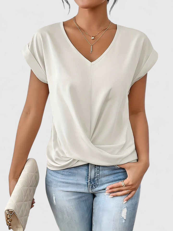 Everyday wear women's top, a comfortable and stylish V-neck blouse with a fashionable twist front.