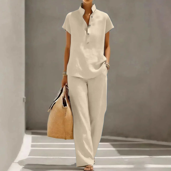 Casual women's resort wear two-piece set with relaxed wide-leg pants and a comfortable short-sleeve summer top.
