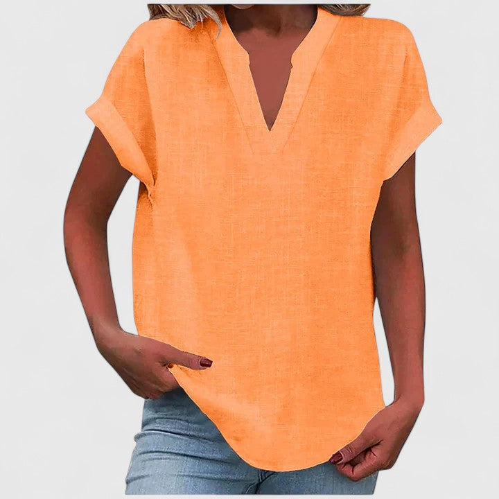 Comfortable V-neck short sleeve blouse for women, an elegant and chic everyday fashion top in a soft fabric.