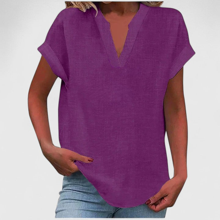 Elegant women's V-neck short sleeve blouse, versatile for casual or dressy fashion, offering effortless chic.