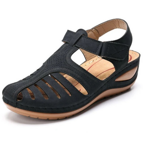 Women's durable walking sandals with decorative cutouts, excellent for summer and warm weather activities