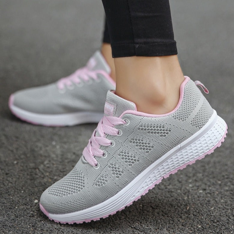 Women's activewear walking shoes, engineered for comfort and strong arch support.