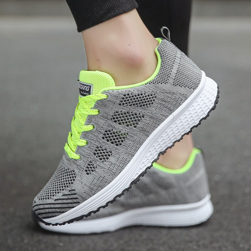 Women's ergonomic walking sneakers, offering arch support and slip resistance.