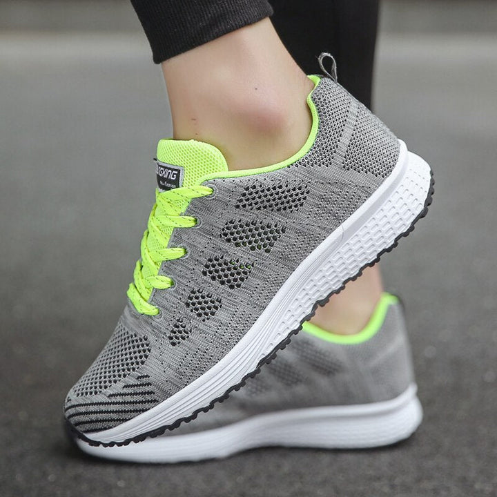Women's ergonomic walking sneakers, offering arch support and slip resistance.