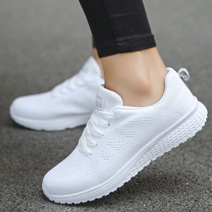 Supportive women's walking shoes, designed for all-day comfort and arch stability.