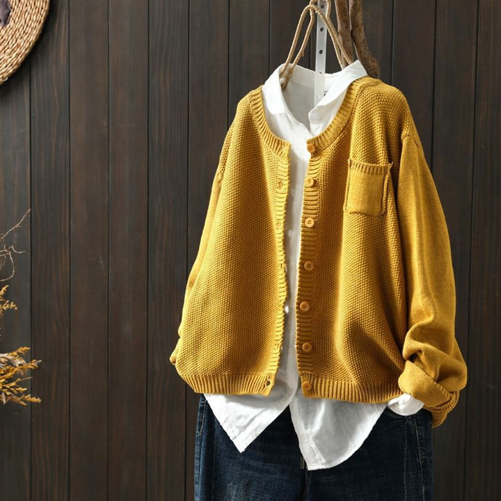 Beige knit cardigan for women, comfortable layering piece with front button closure, everyday fashion.