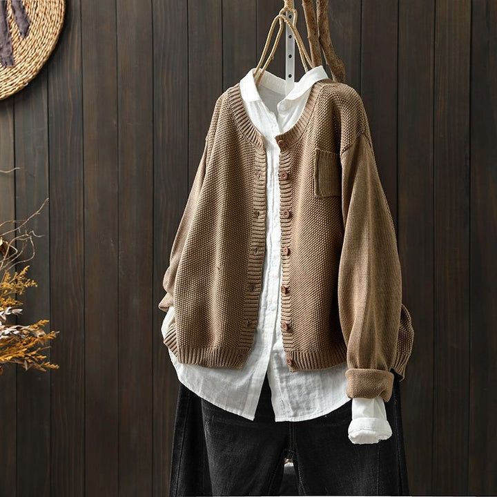 Casual women's knit cardigan with button detail, offering a soft feel and relaxed fit for daily wear.