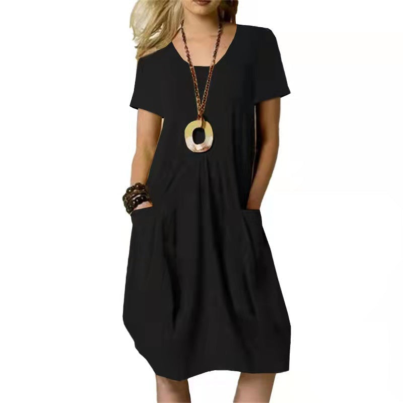 Flowy women's summer swing dress with pockets, comfy short sleeves, ideal for casual everyday wear.