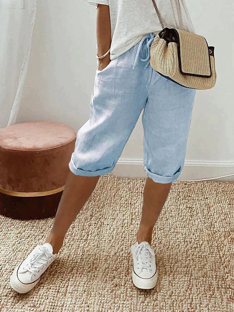 Women's versatile cotton capris with a practical drawstring waist & fashionable roll hem. Great for summer.