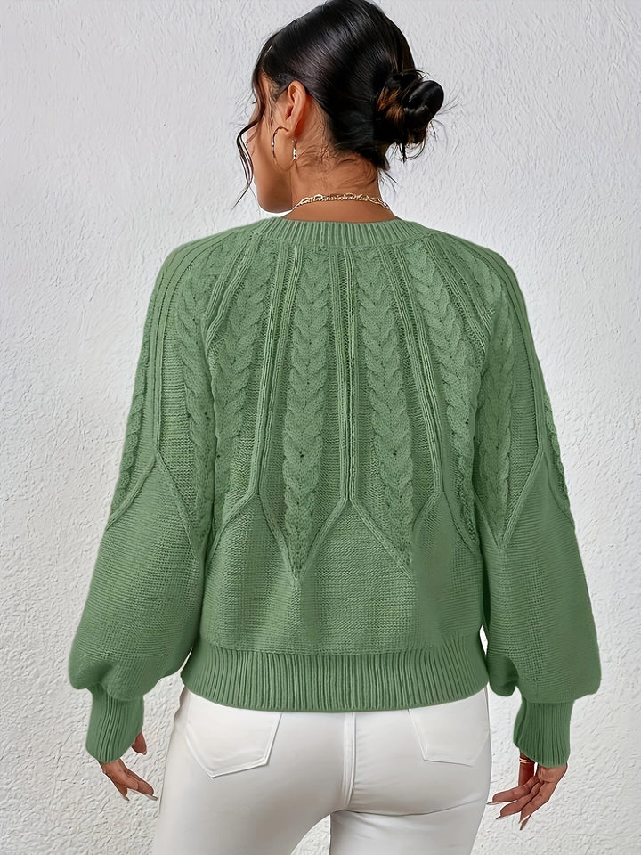 Women's cozy cable knit sweater, relaxed fit, perfect for fall fashion & everyday wear.