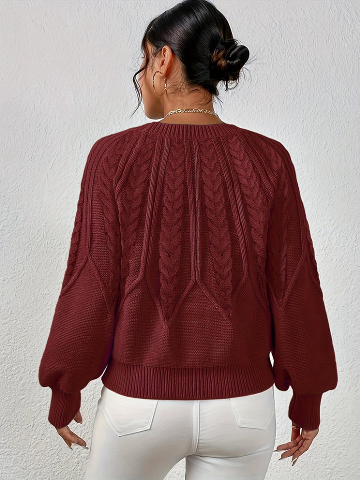 Soft women's cable knit sweater, relaxed fit, in a versatile cream color for fall.