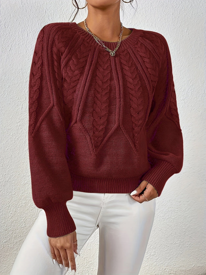 Chunky cable knit women's sweater, relaxed fit, a must-have for winter warmth.