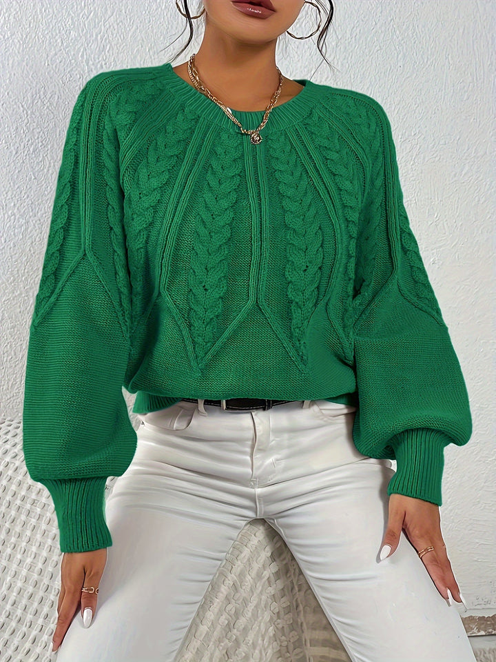 Stylish women's relaxed fit sweater, cable knit design, perfect for layering.
