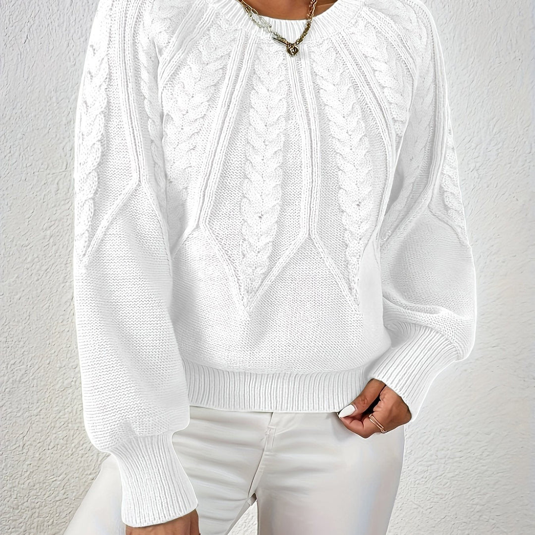 Cozy women's relaxed fit cable knit sweater, an ideal choice for stylish winter looks.