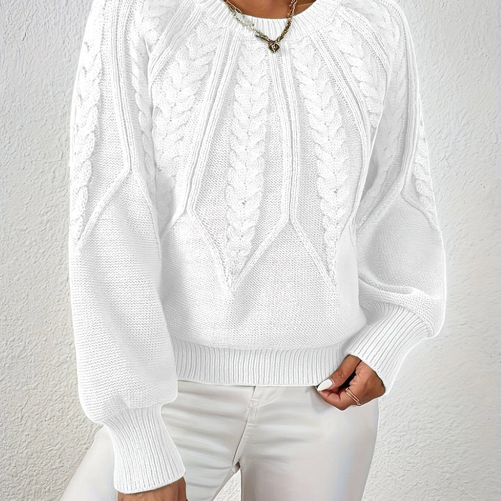 Cozy women's relaxed fit cable knit sweater, an ideal choice for stylish winter looks.