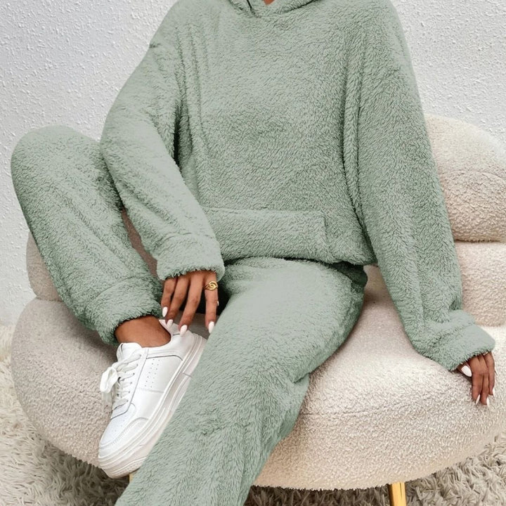 Cozy women's loungewear set with hood, ideal for relaxing; fashionable spring comfort clothing.