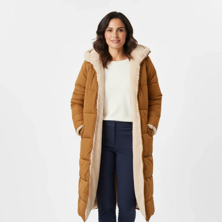 Women's cozy hooded puffer jacket in black, ideal for winter fashion & cold weather outerwear.