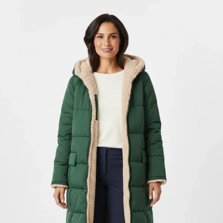 Women's hooded long puffer jacket, a stylish quilted coat for cold weather & winter fashion.
