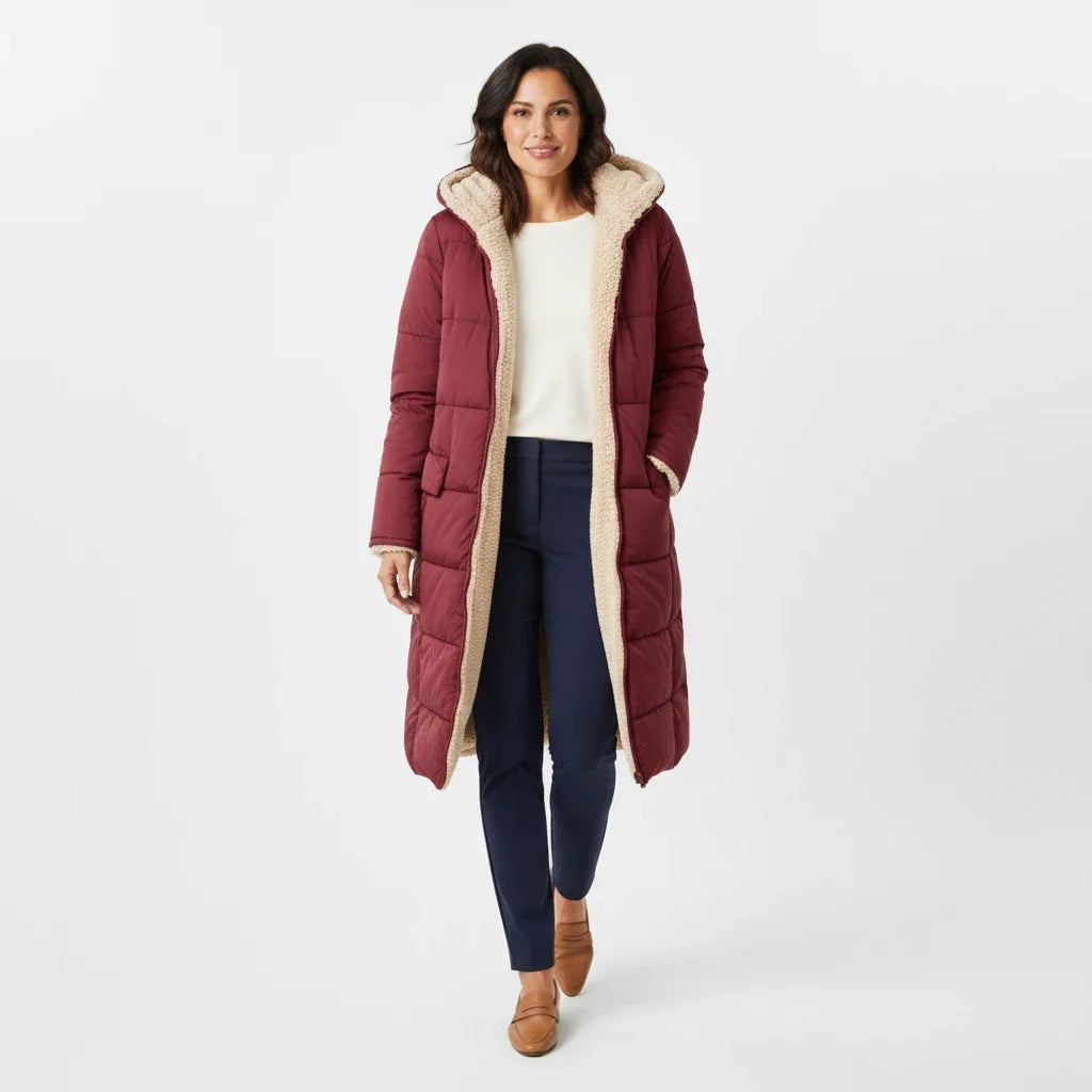 Women's hooded puffer jacket, ideal for winter essential, cozy style, & cold weather fashion.