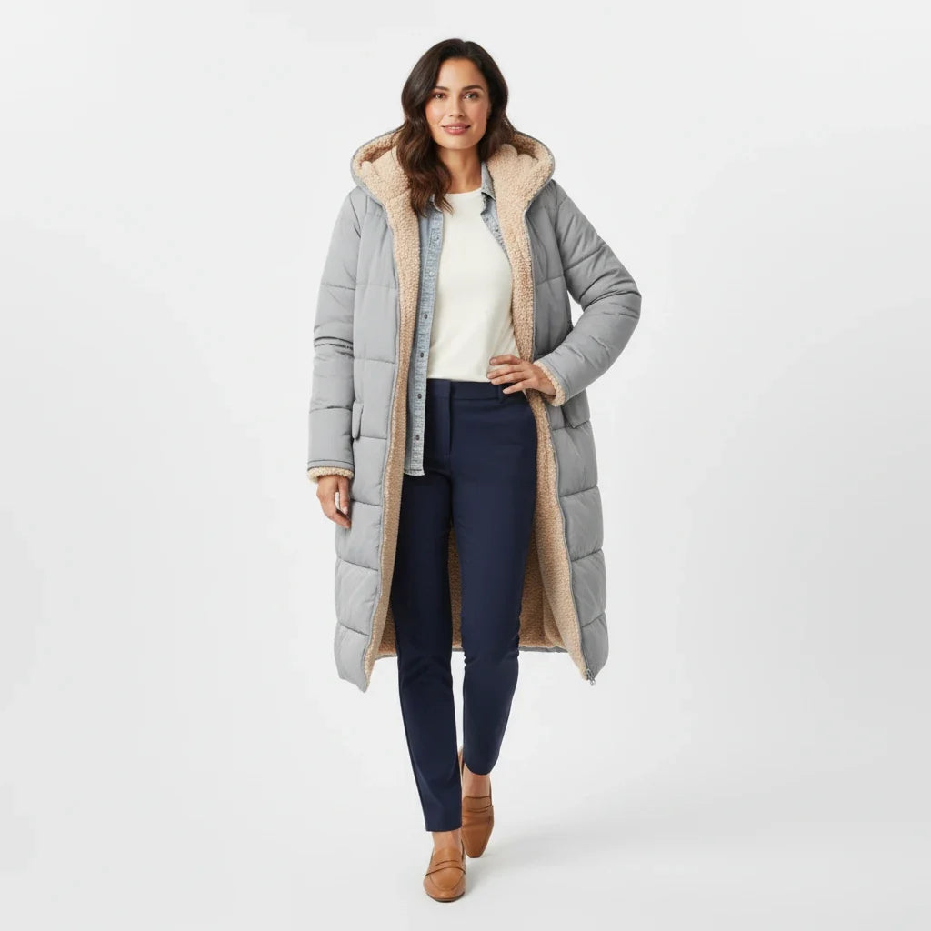 Women's hooded long puffer coat, a winter essential for cold weather outerwear & fashion.