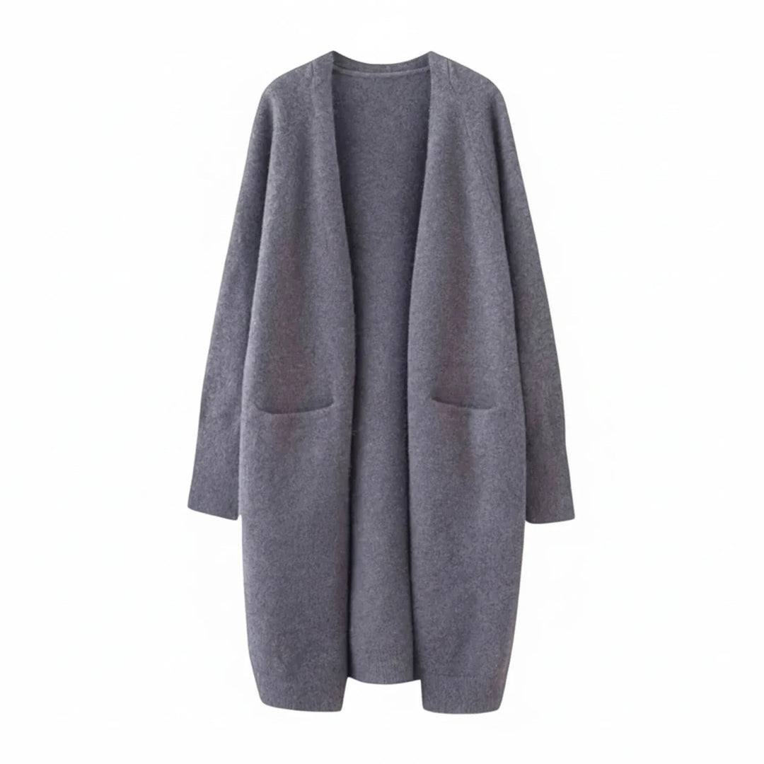 Comfortable women's long open front cardigan with patch pockets. Ideal winter sweater for a relaxed and chic look.
