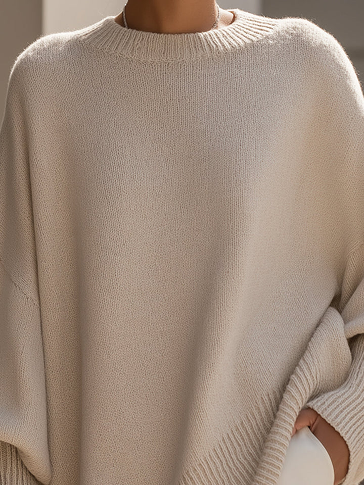 Elegant women's oversized long sleeve pullover, versatile for casual wear or chic winter style.