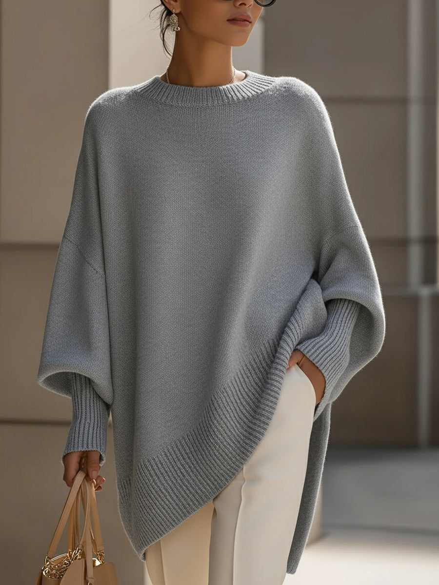 Relaxed fit women's oversized sweater with long sleeves, offering cozy comfort and chic fall fashion.