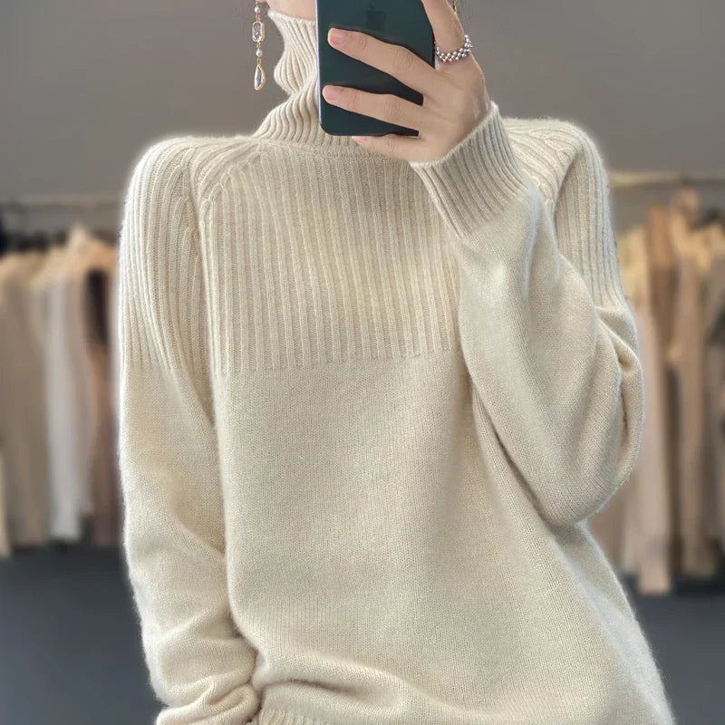 Elegant women's ribbed turtleneck sweater, long-sleeve knitwear ideal for layering in winter fashion.