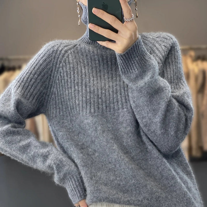 Chic women's cozy ribbed turtleneck sweater. Comfortable long-sleeve pullover for everyday winter style.