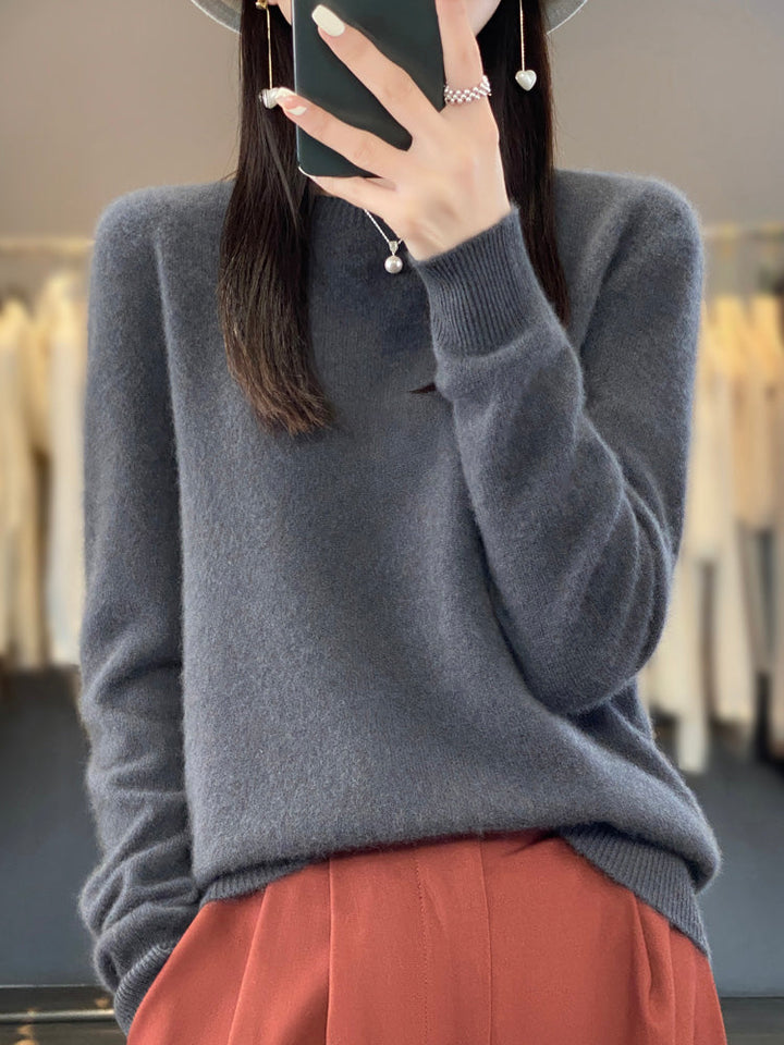 Stylish grey women's round neck pullover sweater, relaxed fit for comfort.
