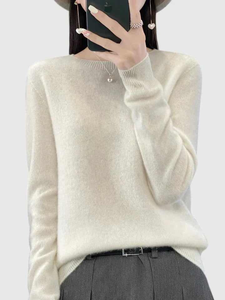 Women's round neck long sleeve pullover, providing cozy warmth and style.