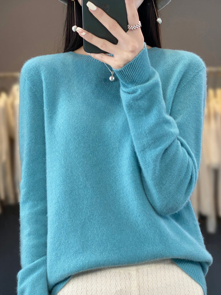 Chic women's relaxed fit round neck pullover sweater, ideal for everyday style.