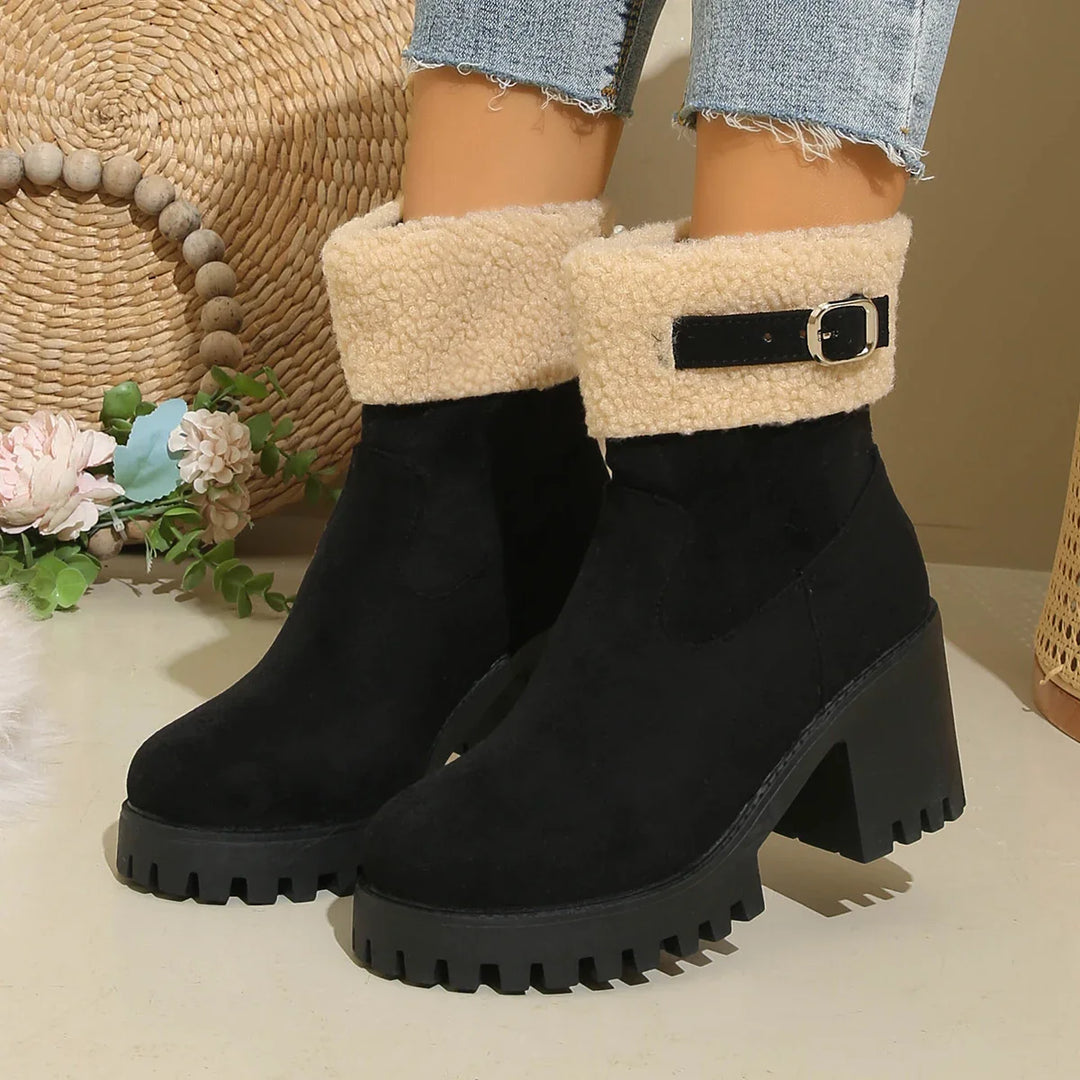 Fashionable women's sherpa ankle boots, combining cozy footwear with modern winter style.