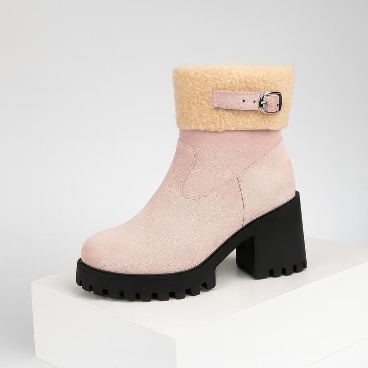 Comfortable women's ankle boots with sherpa interior, designed for cozy all-day wear.