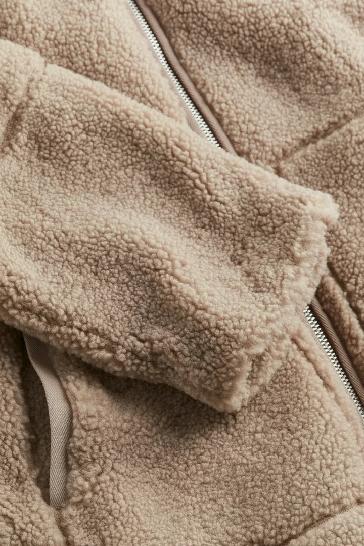 Everyday cozy women's sherpa zip-up jacket. Warm outerwear, ideal for casual autumn & winter comfort and style.