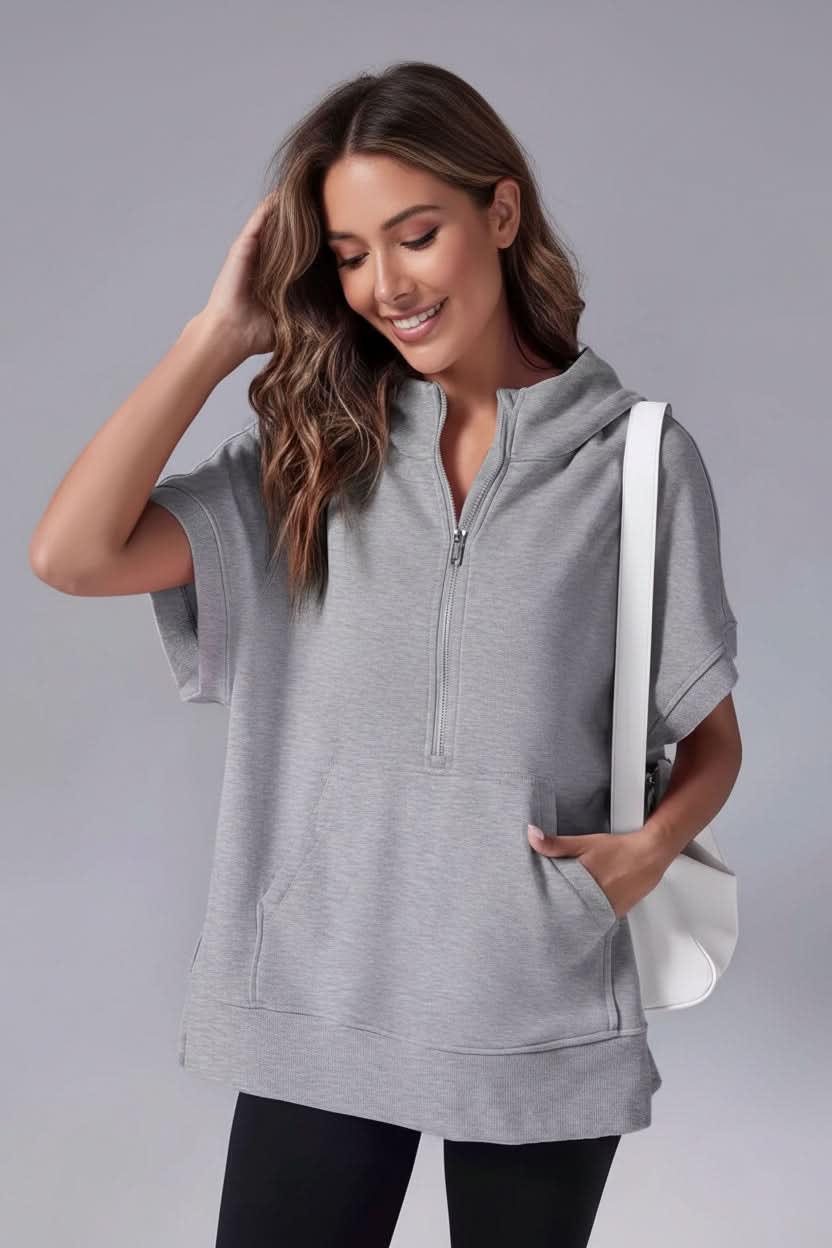 Comfortable women's short sleeve pullover hoodie, relaxed fit, half zip, ideal for loungewear or sporty style.