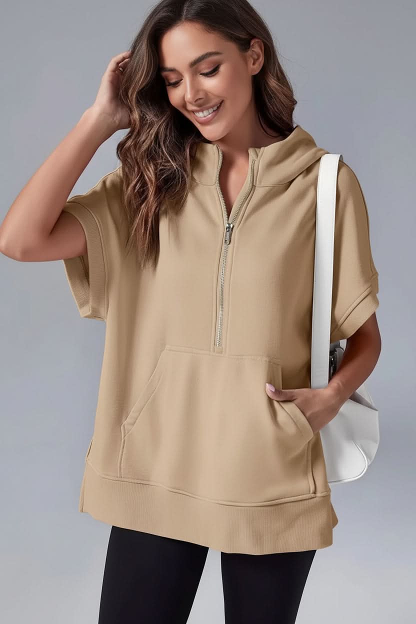 Soft women's cozy short sleeve half-zip hoodie, relaxed fit, offering ultimate comfort for everyday wear.